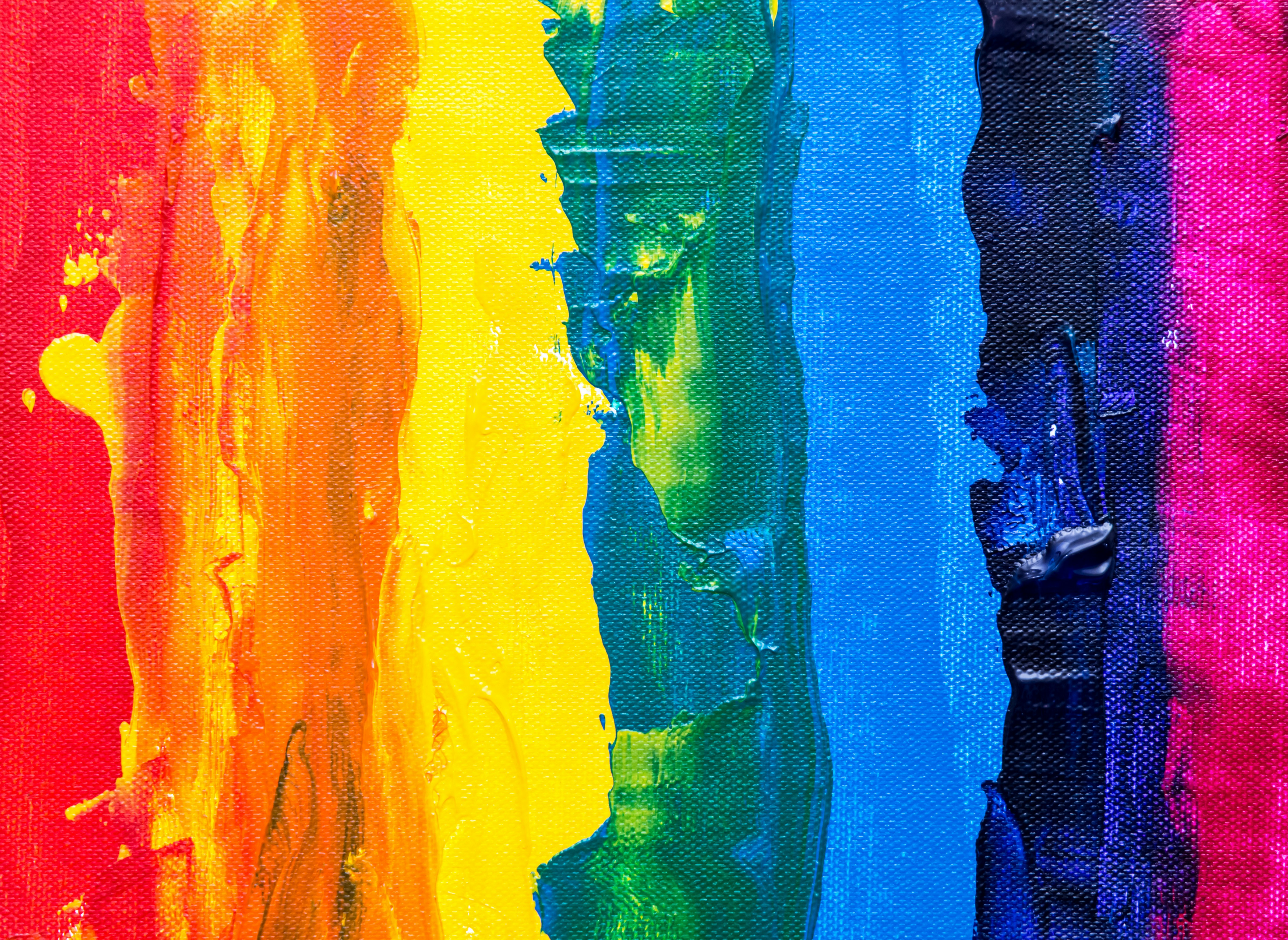 thick paint in rainbow-coloured stripes