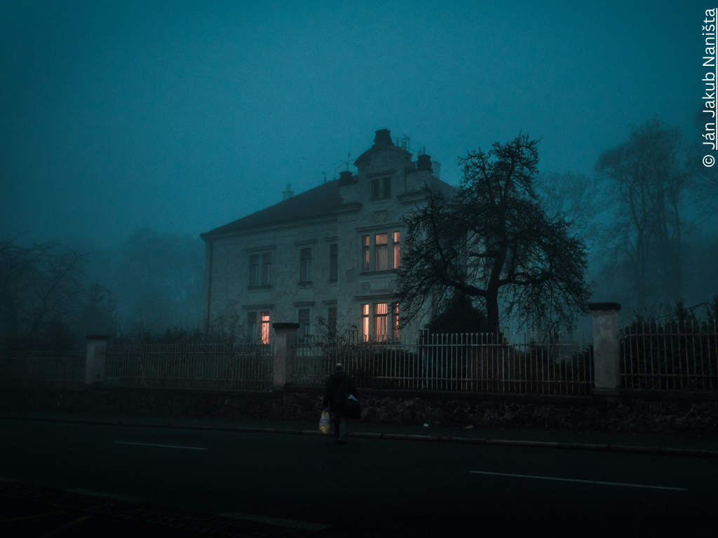A haunted-looking house in the mist